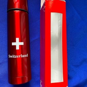 NIB, Switzerland thermos, insulated stainless steel, earbuds pictured for size
